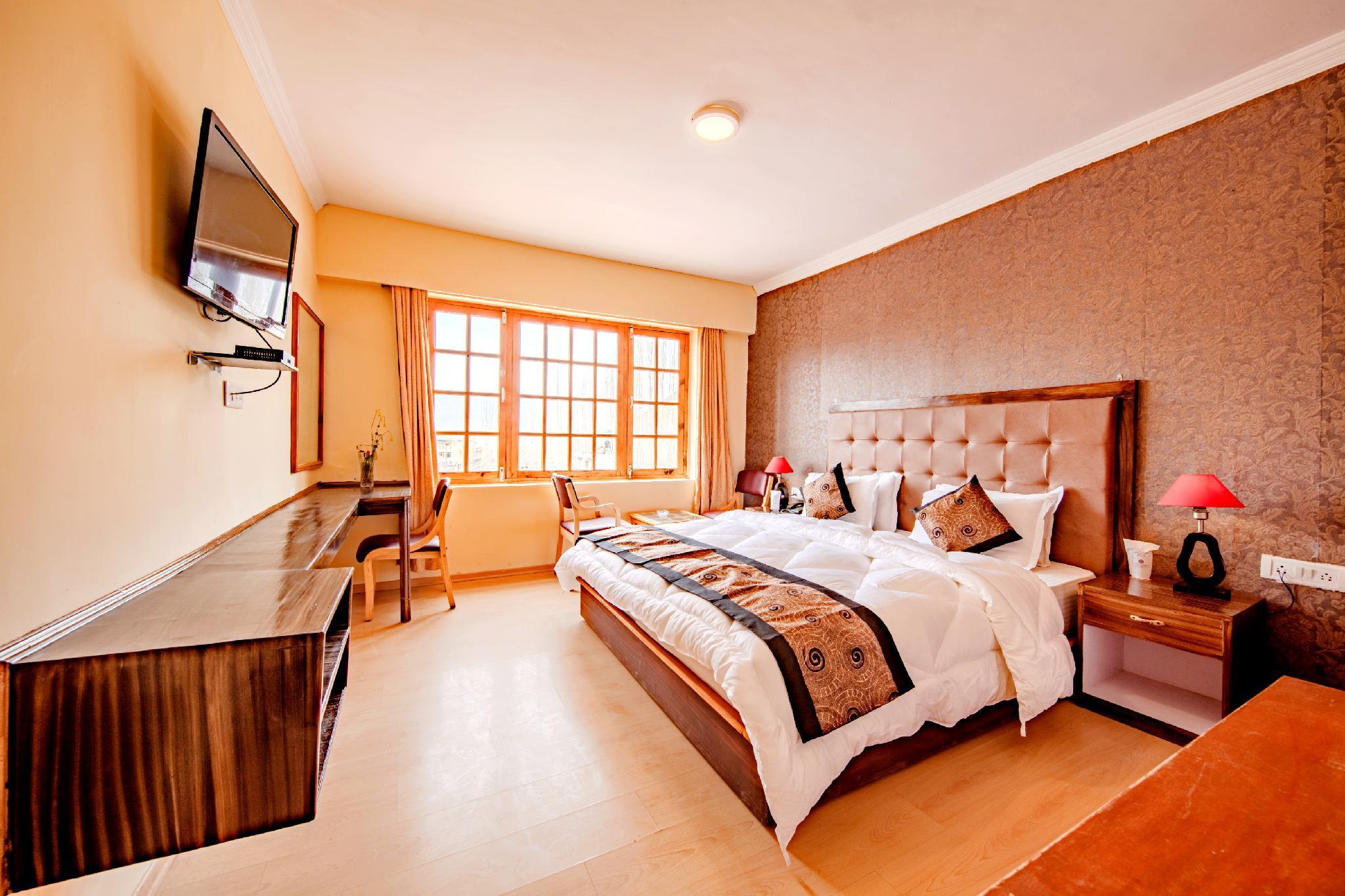 Hotel Mandala Hotel Mandala is conveniently located in the popular Leh area. The hotel offers a wide range of amenities and perks to ensure you have a great time. Free Wi-Fi in all rooms, photocopying, taxi service