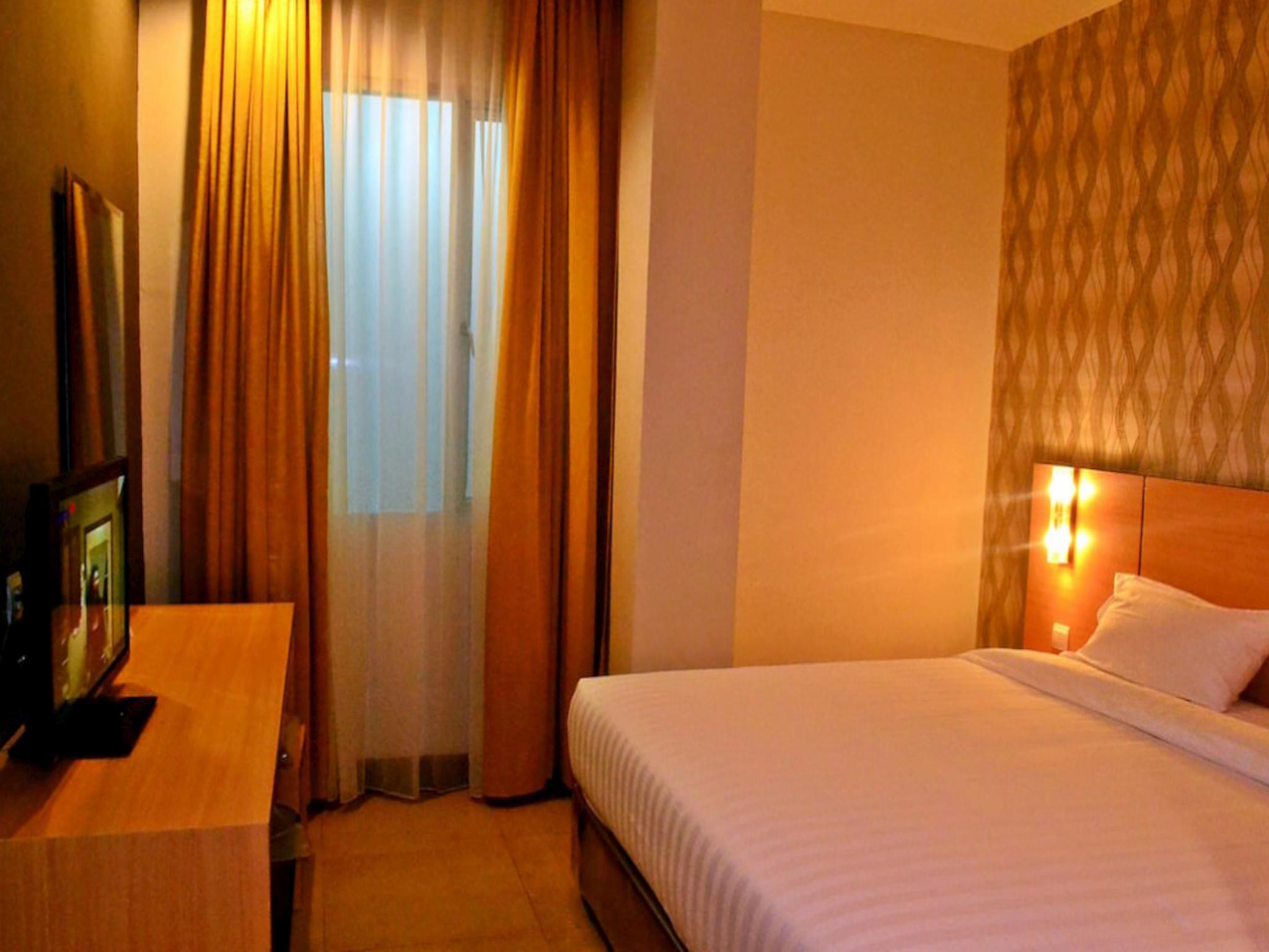 Grand Impression Hotel Medan Ideally located in the prime touristic area of Medan Baru, Grand Impression Hotel Medan promises a relaxing and wonderful visit. The property features a wide range of facilities to make your stay a pl