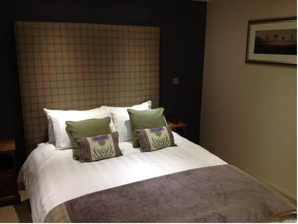 The Woodman Inn The 4-star The Woodman Inn offers comfort and convenience whether youre on business or holiday in Huddersfield. The hotel offers guests a range of services and amenities designed to provide comfort a