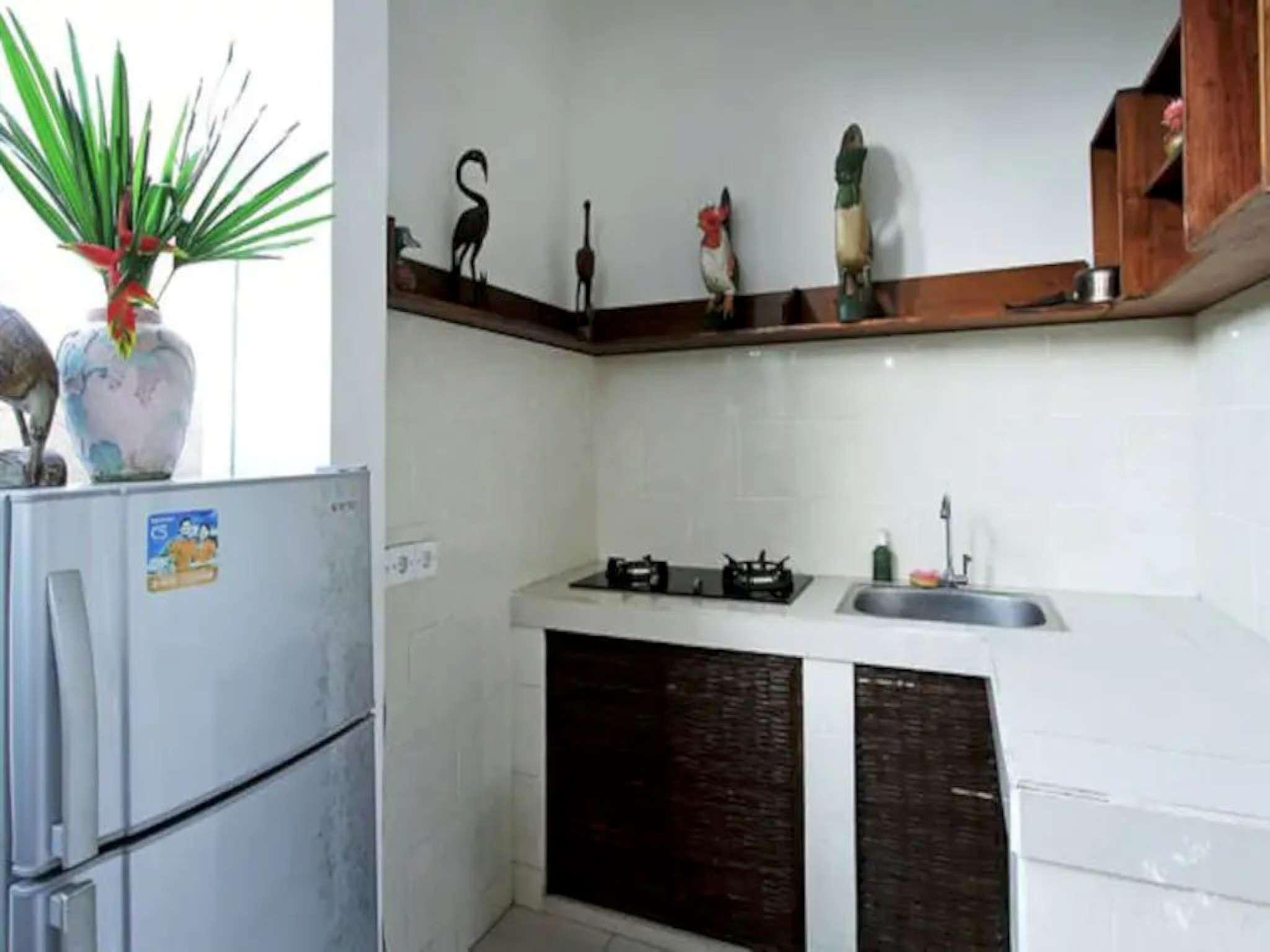 This photo about  Bright and Cosy Balinese Cottage with Pool shared on HyHotel.com