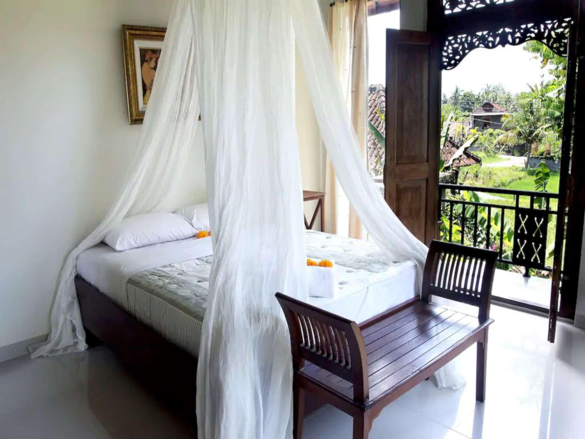 This photo about  Bright and Cosy Balinese Cottage with Pool shared on HyHotel.com