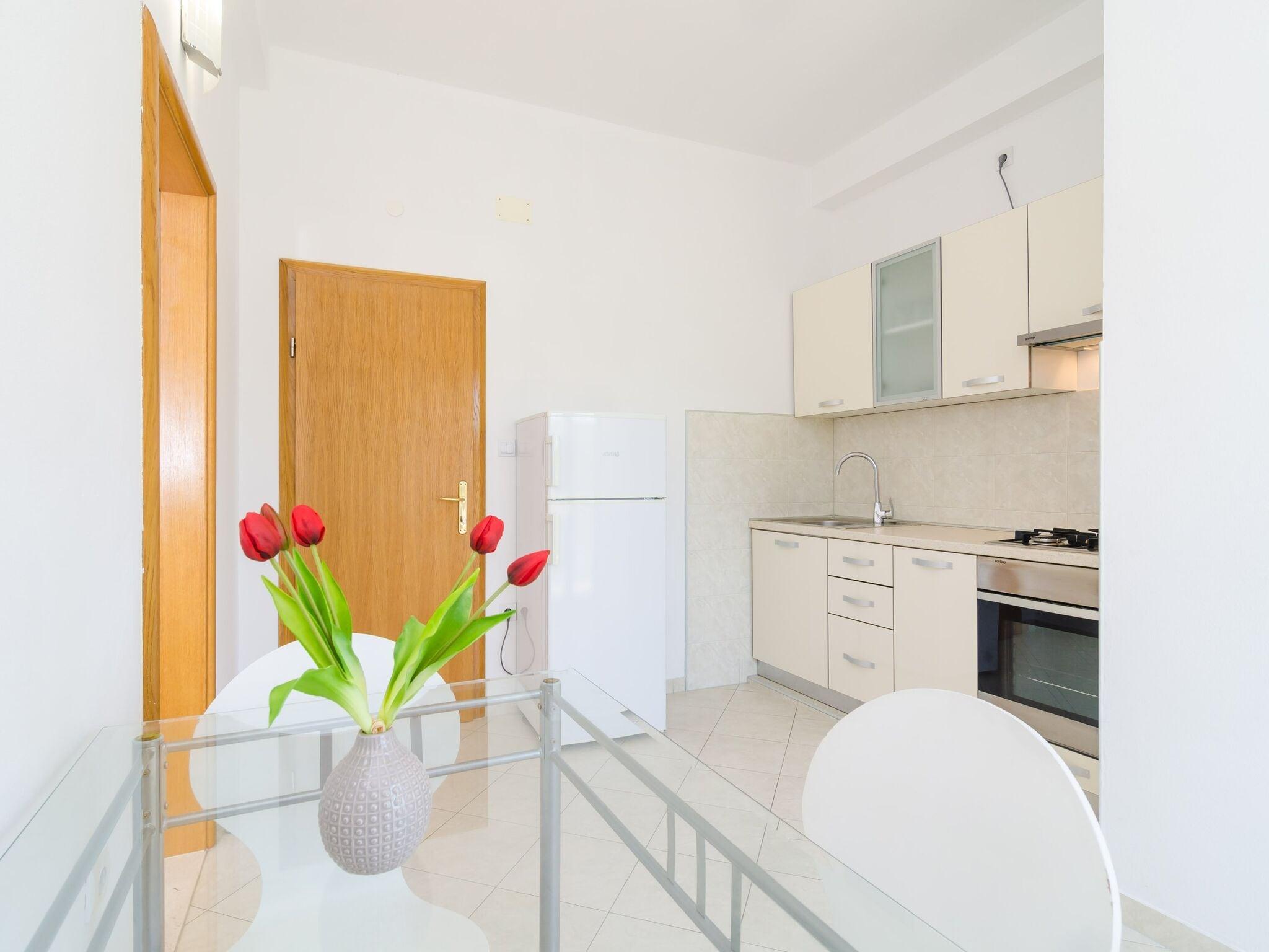 Slide image 1 for Apartments  Rooms Barisic - Studio Apartment with Balcony and Garden View First Floor-APT 2