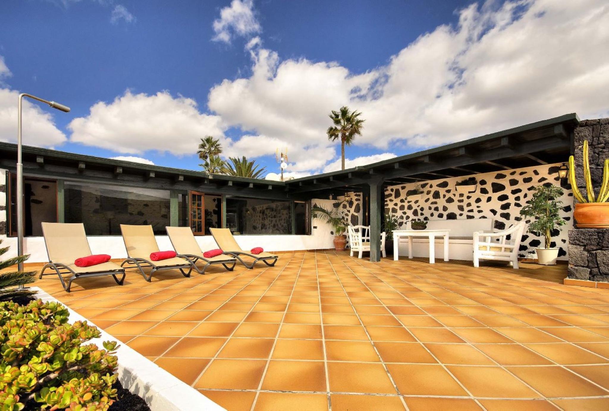 This photo about 105923 -  House in Tías shared on HyHotel.com