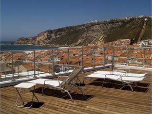 Hotel Praia The 4-star Hotel Praia offers comfort and convenience whether youre on business or holiday in Nazare. Featuring a complete list of amenities, guests will find their stay at the property a comfortable