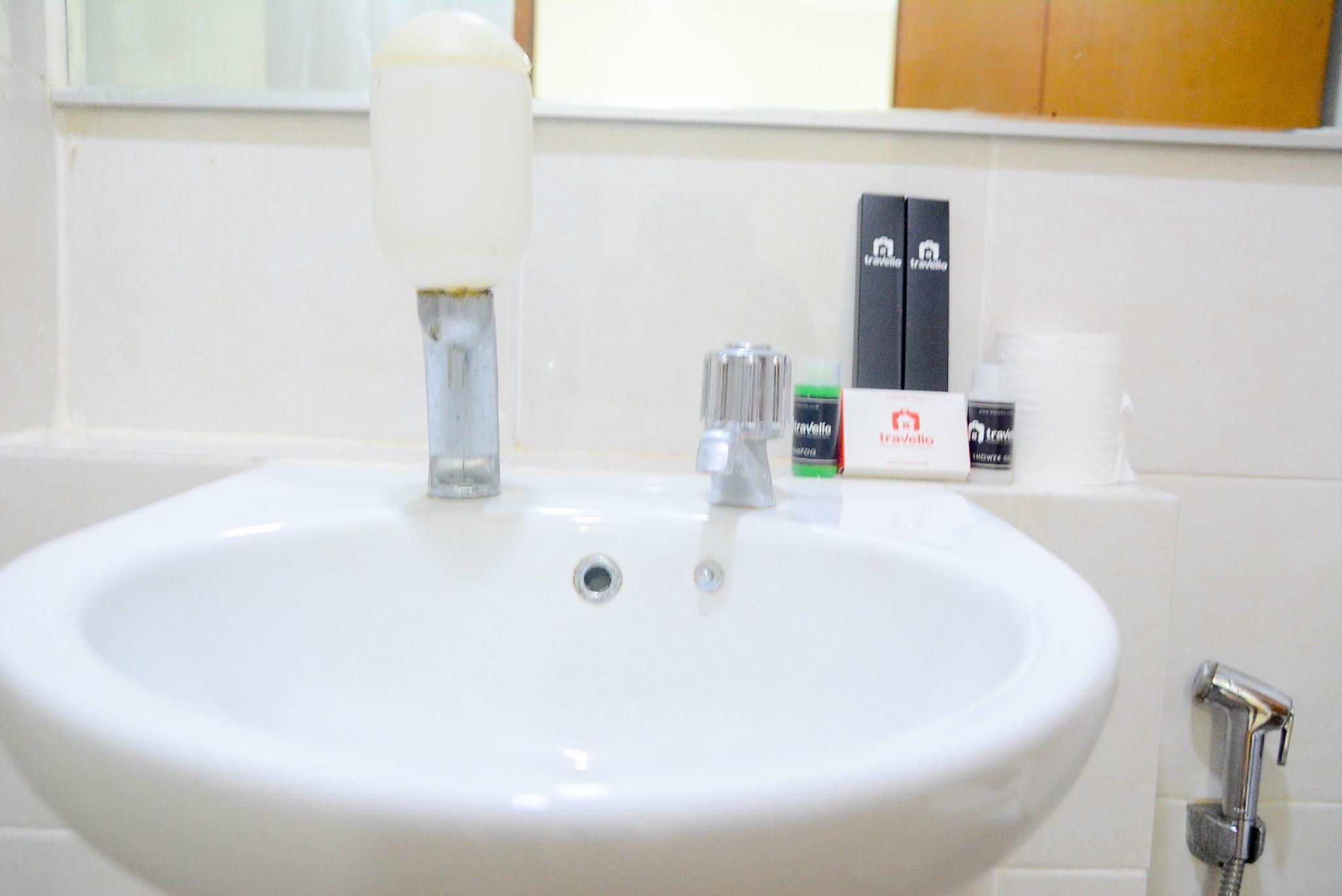 This photo about Spacious 1BR Apt @ Green Bay Pluit By Travelio shared on HyHotel.com