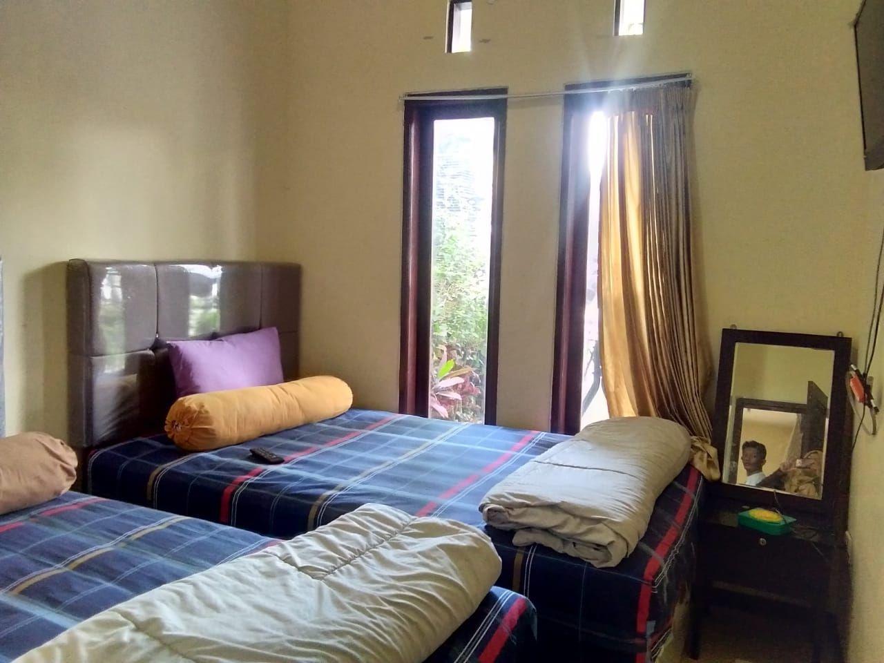 This photo about Villa  22pax Near Jawa Timur Park 1, Batu shared on HyHotel.com